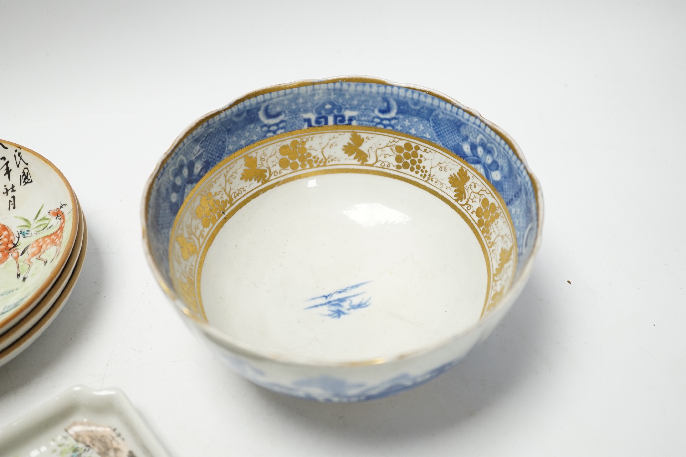 Five items of Chinese tableware; a rectangular tray, three shallow dishes, and a blue and white bowl with gilt decoration, bowl diameter, 14.5cm